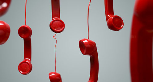 red phones hanging in the air emergency communication plan